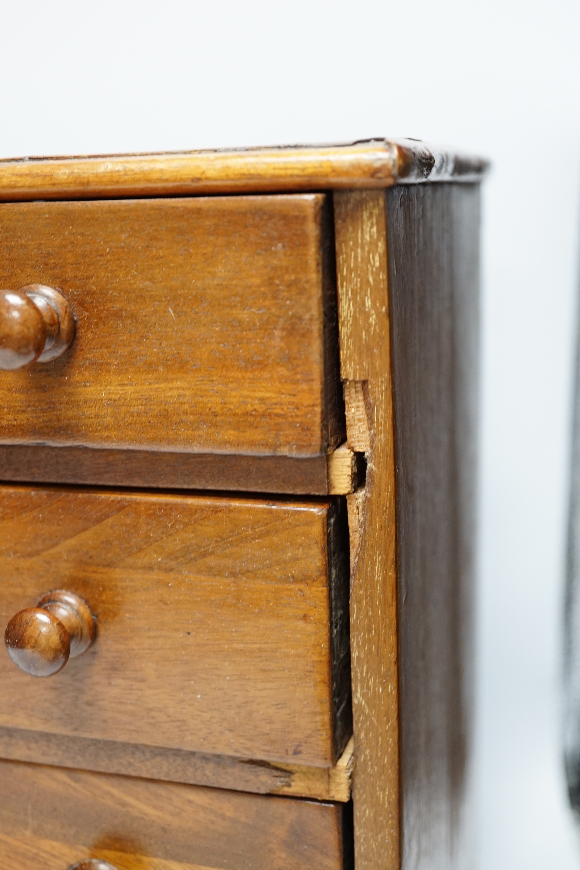 A Victorian mahogany miniature four draw chest, an amboyna glove box and a games box